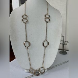 Long futuristic floating circles goldtone chain necklace
